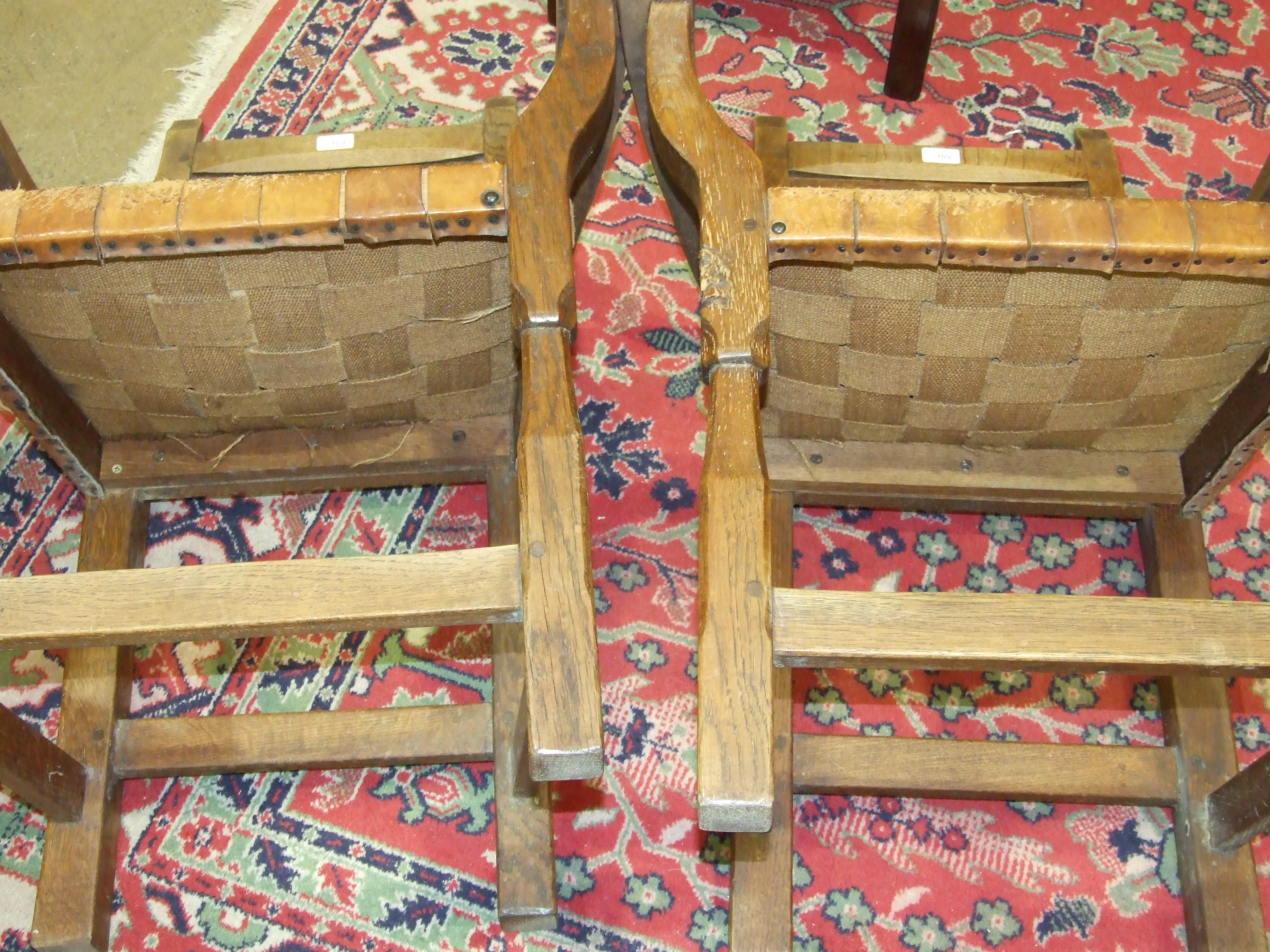 A pair of Thomas 'Gnomeman' Whittaker oak carver chairs, each with panelled back, woven-leather seat - Image 4 of 6