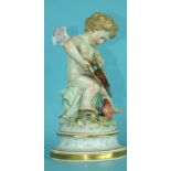 A 19th century Meissen porcelain figure of a winged cherub lighting the flaming heart with his