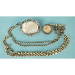 A silver-mounted mother-of-pearl and onyx swivel brooch, a miniature of a young lady in a pearl-