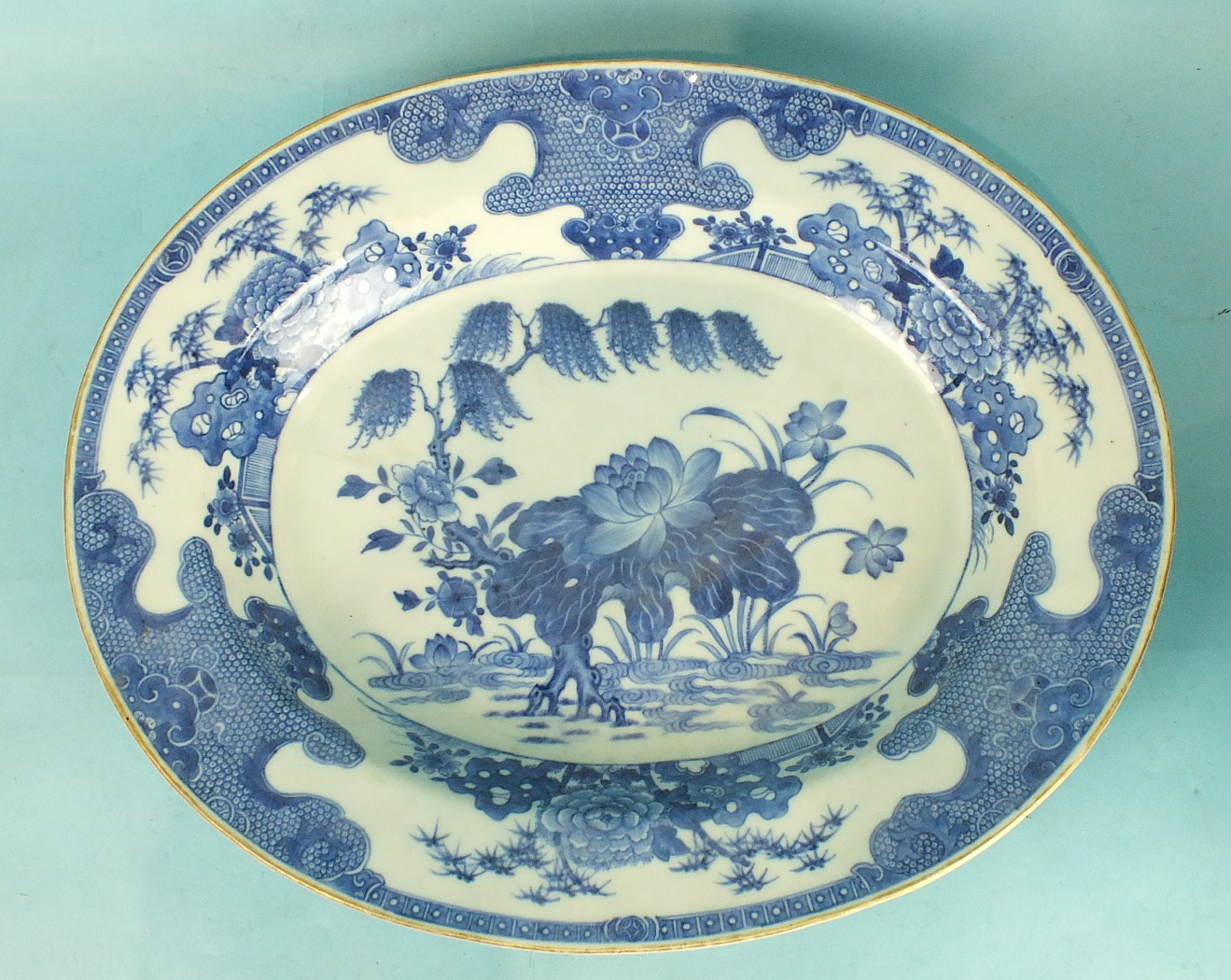 An early-19th century Chinese Export oval tureen, cover and stand painted with water plants below - Image 2 of 3