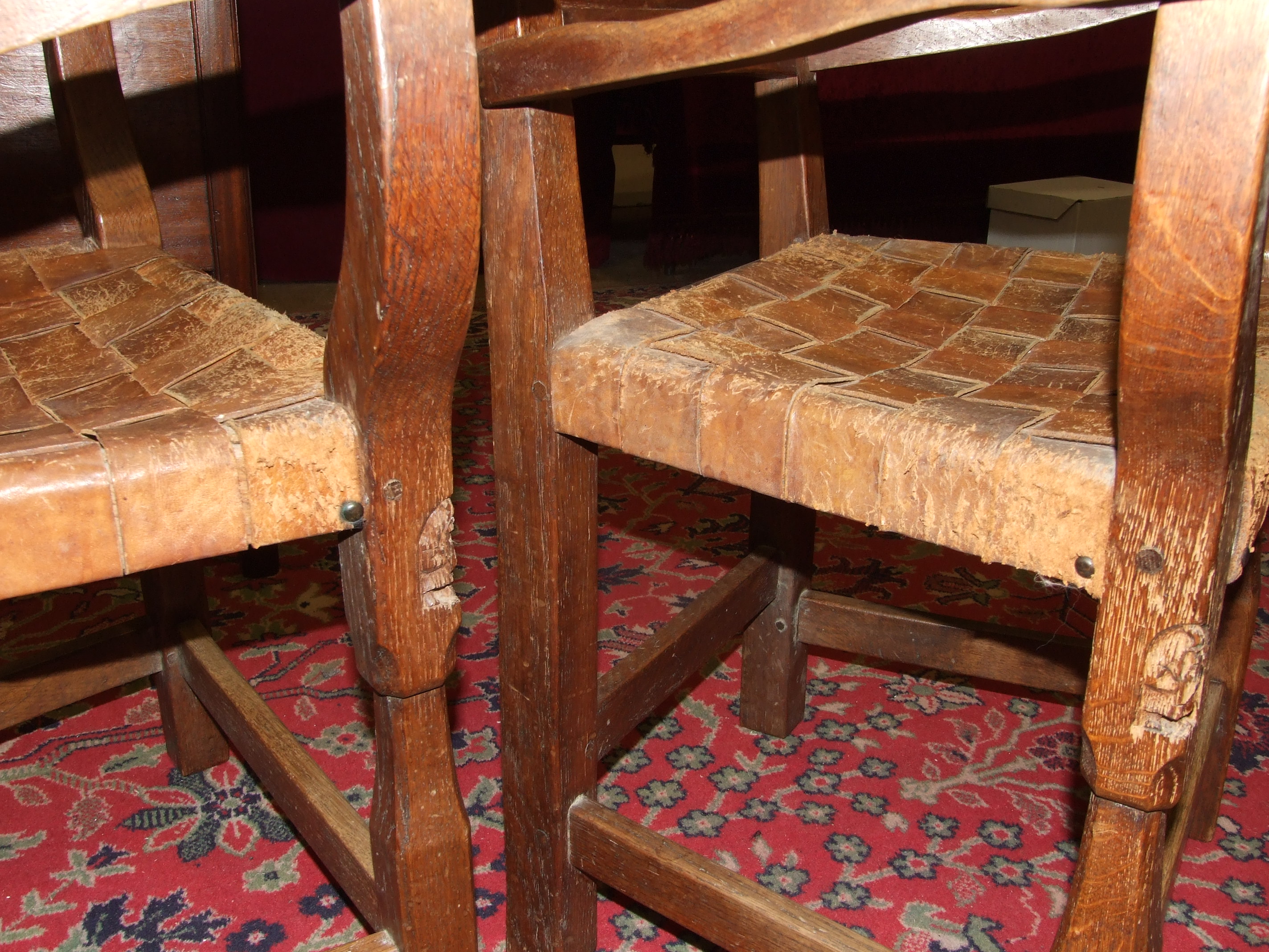 A pair of Thomas 'Gnomeman' Whittaker oak carver chairs, each with panelled back, woven-leather seat - Image 5 of 6