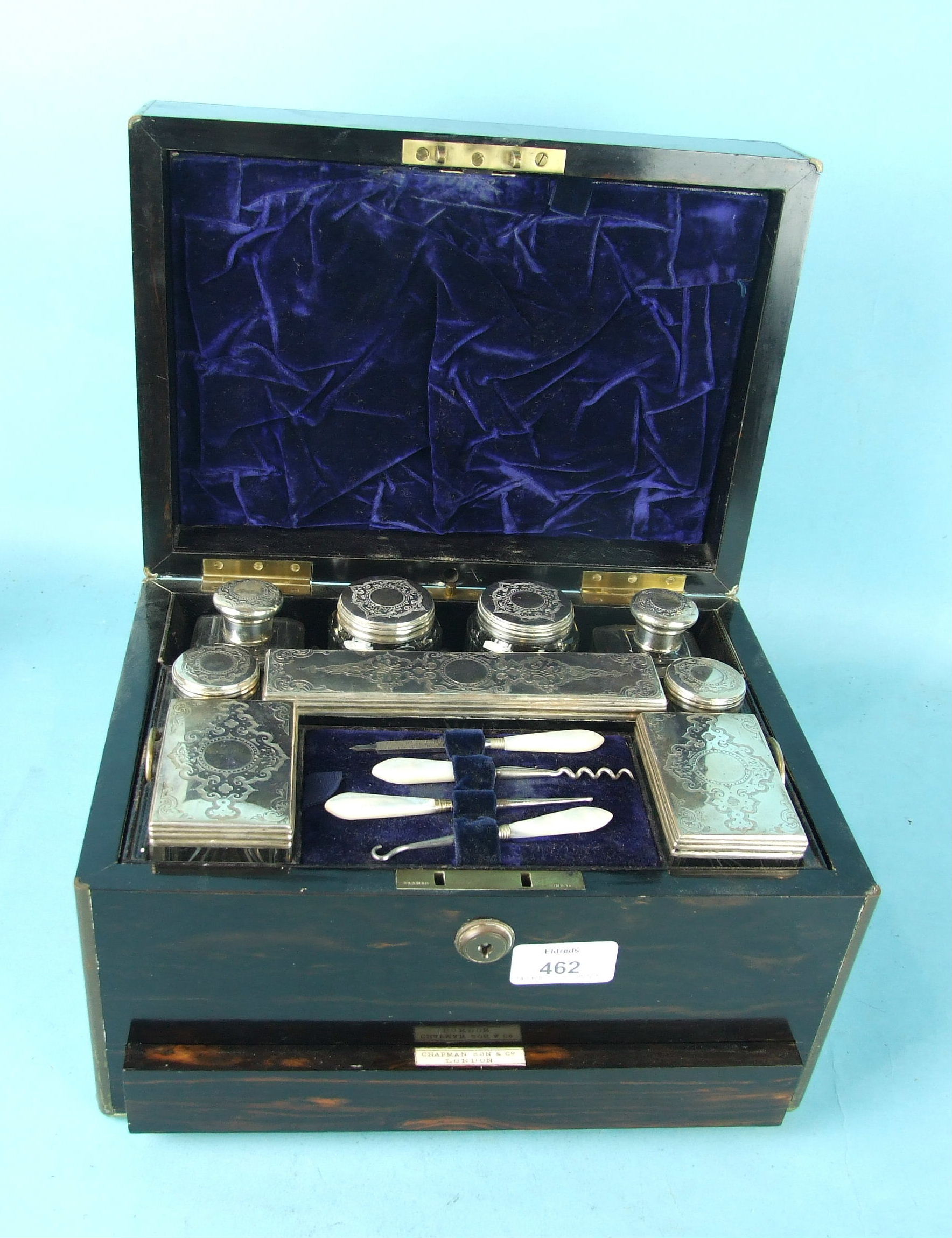 A Victorian ladies coromandel wood brass-bound dressing case by Chapman Son & Co, London, fitted