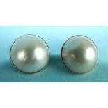 A pair of 9ct gold ear clips set large mabé pearls, each 1.6cm diameter, 7.5g.