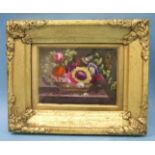 Style of Thomas Steele, a porcelain plaque painted with a basket of flowers resting on a marble