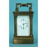 A miniature brass carriage clock, the pillar and corniced case with rectangular enamelled dial, 11cm