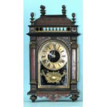 A 19th century French ebony and Boulle mantel clock of architectural form, with 'MARTI' drum