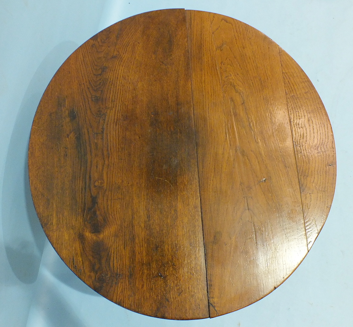 An antique oak tilt-top occasional table on turned column and tripod support, 75cm diameter. - Image 2 of 2