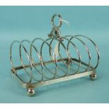 A George IV six-division wire toast rack on ball feet, Sheffield 1825, maker IS TS, ___7oz.