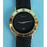 Gucci, a gents quartz wrist watch, the circular black face with Roman numerals on bezel, original