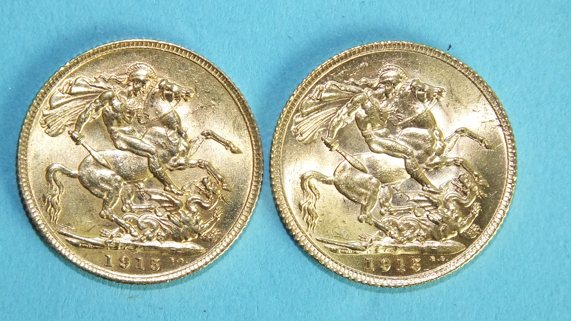 Two George V 1915 sovereigns, (2).