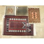 A 20th century Baluchi prayer mat, 86 x 140cm and three other small mats, (4).