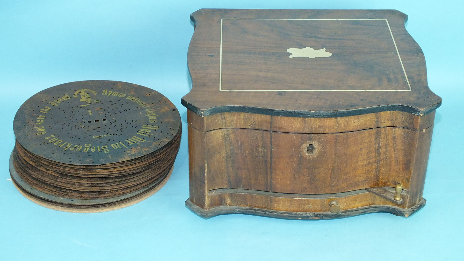 A Victorian walnut Polyphon music box playing 8¼" discs, single comb in good order, 38cm wide, - Image 2 of 2