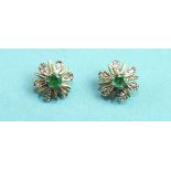 A pair of emerald and diamond flower-head cluster ear studs with 18ct gold mounts, 2.9g.