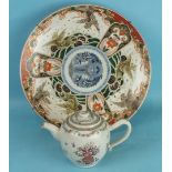 A 19th century Japanese Imari charger decorated with flying fish above waves, blue dragon to centre,