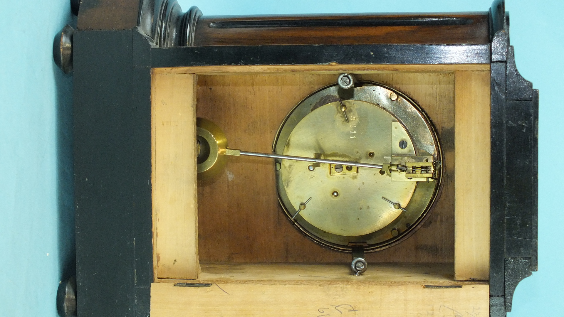 A 19th century walnut and mahogany mantel clock with circular enamelled dial and drum movement, 27cm - Image 2 of 2