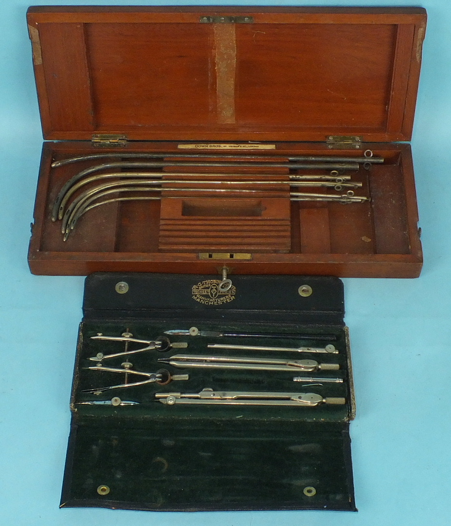 A collection of seven urethra needles in fitted box by Down Bros, St Thomas's Street, London and a