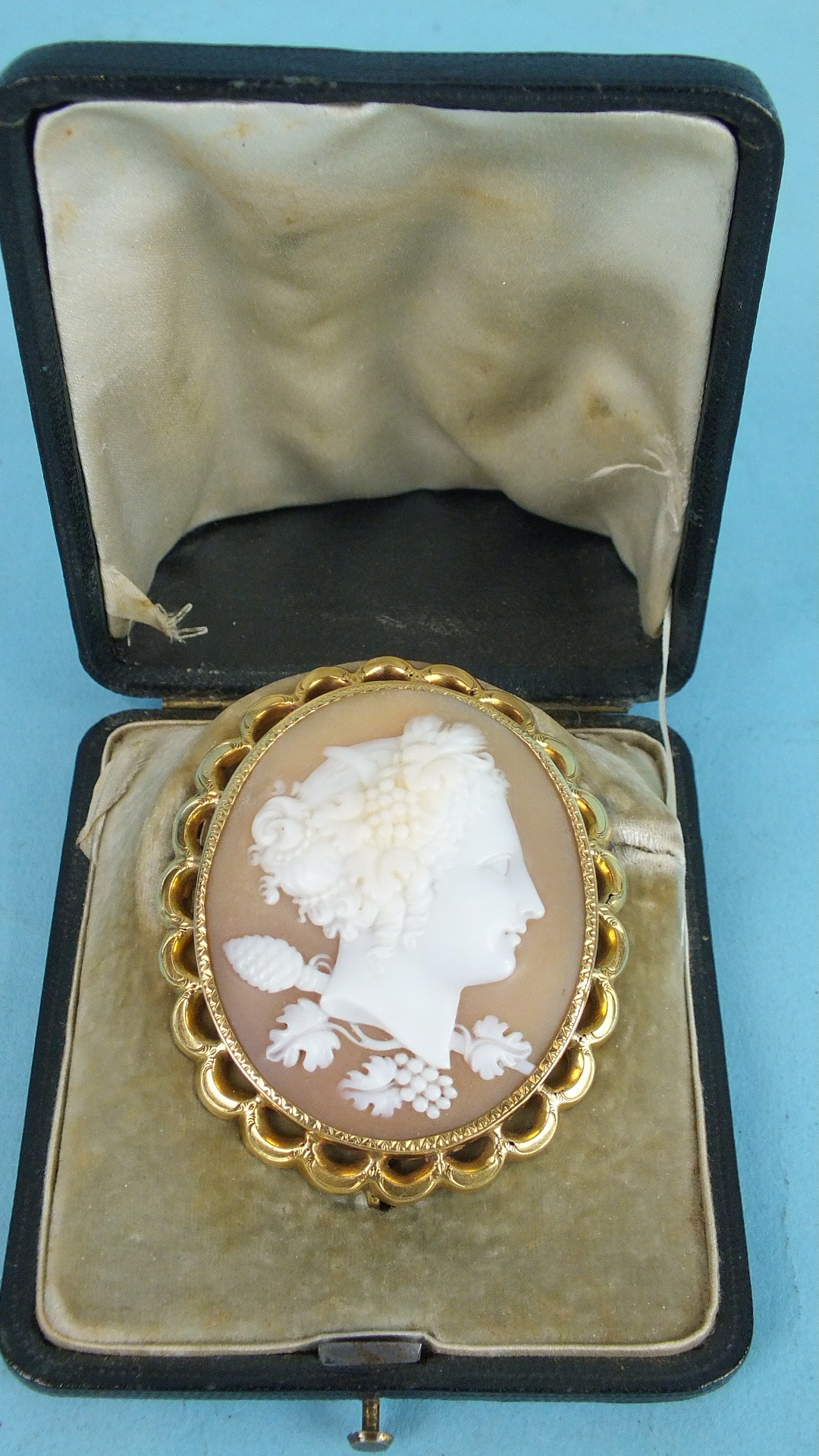 A Victorian shell cameo brooch portraying a bust of Demeter with grapes in her hair and pine cone - Image 2 of 2