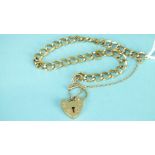A 9ct gold curb-link bracelet with padlock clasp, 8.8g.