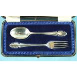 A cased christening set comprising a spoon and fork, Sheffield 1919, ___2oz.
