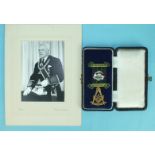 A 9ct gold Masonic jewel of Lodge Ailsa No.1172 SC in the form of a compass and set square, the