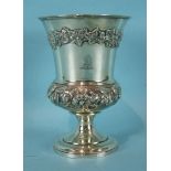 A George IV campana-shaped cup on circular foot, with embossed foliate and ivy decoration, London