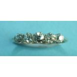 A five-stone diamond ring claw-set five graduated old brilliant-cut diamonds, totalling