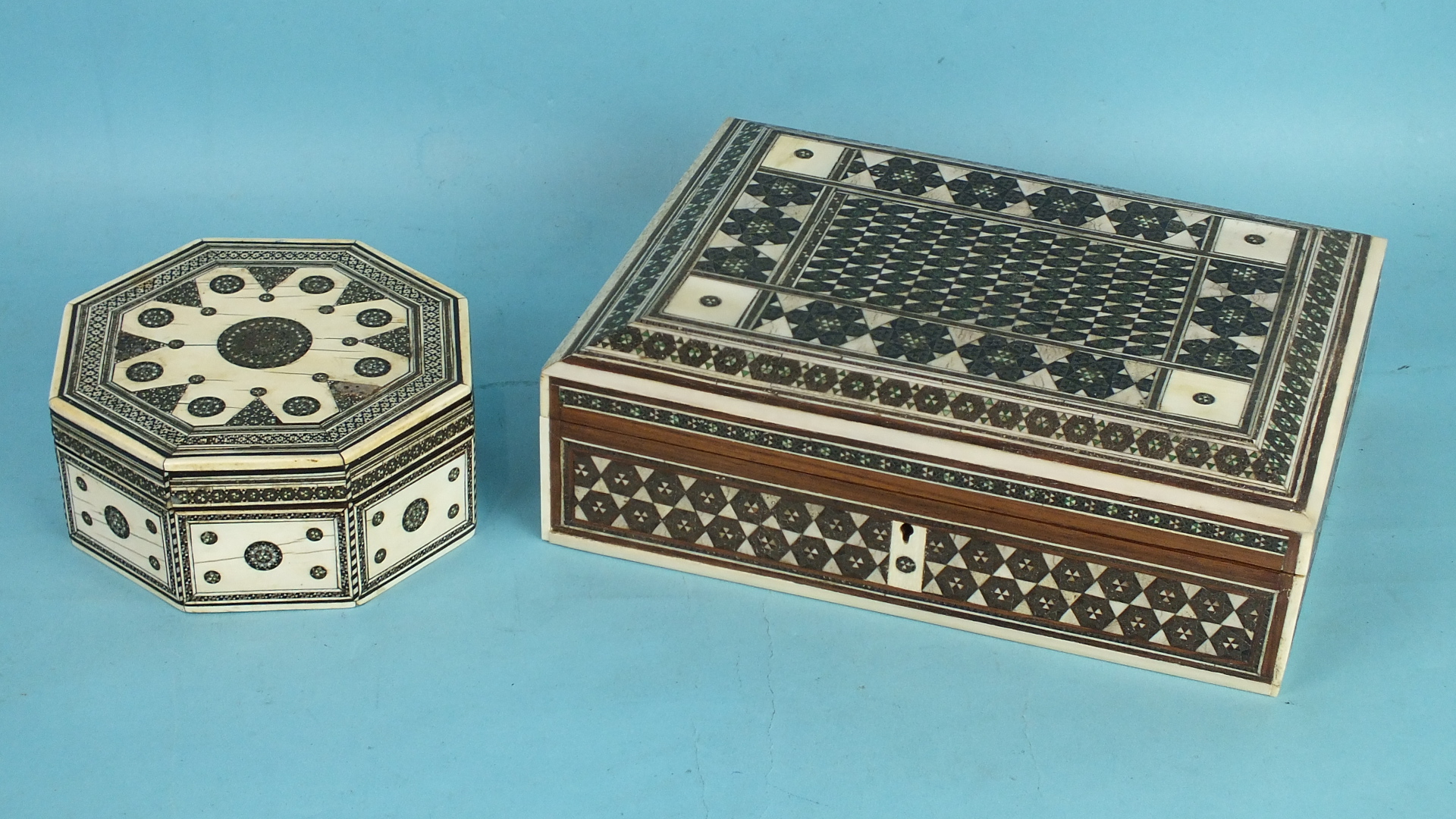 A late-19th century Sadeli sandalwood box and cover of octagonal form, 13cm diameter, together