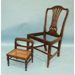 A 19th century rosewood child's chair with cane seat and carved turned legs, 33cm wide, 41cm high.