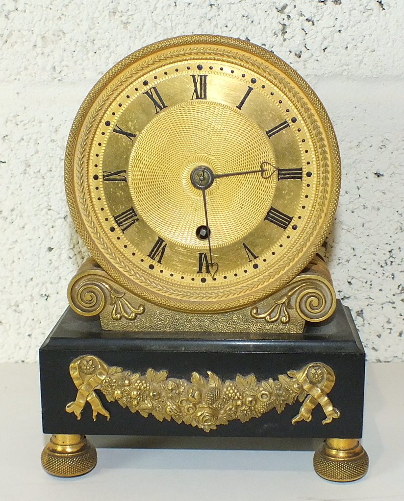 Viner, New Bond Street, London, an early-19th century ormolu mantel clock, the circular engraved