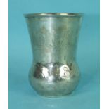 A Continental beaker of thistle shape with engraved floral decoration, 7.5cm high.