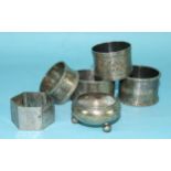 Five silver napkin rings and a small silver salt, various dates and makers, ___6½oz, (6).