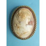 A shell cameo brooch portraying a young girl amongst leaves, in 9ct gold rope-twist mount, 5 x 3.