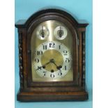 A 20th century oak mantel clock, the dial with silvered chapter ring, chime/silent and slow/fast