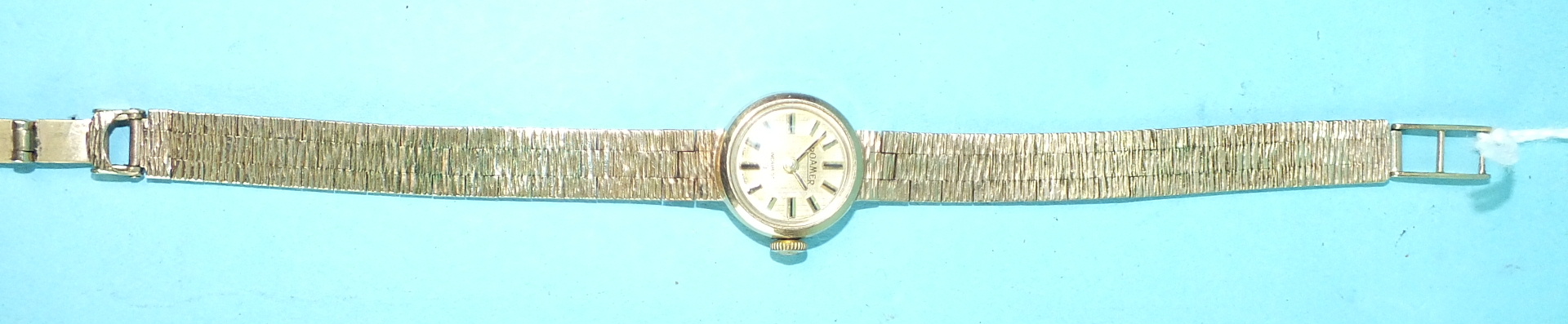 Roamer, a ladies 9ct gold wrist watch with circular dial and integral textured brick-link