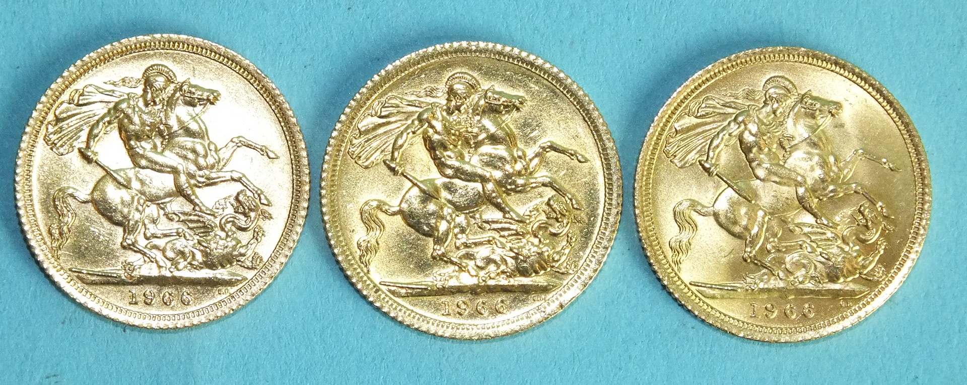 Three Elizabeth II 1966 sovereigns, (3).