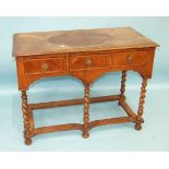 An 18th century inlaid walnut side table, the top and three frieze drawers on spiral-twist legs