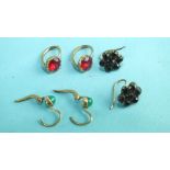 A pair of 19th century earrings set red foiled paste stones, a pair of Bohemian garnet earrings