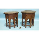 Two octagonal brass inlay hardwood occasional tables with hinged folding stands, (some inlay