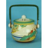 A Clarice Cliff Fantasque Bizarre 'Secrets' pattern biscuit barrel and cover, with wicker handle,