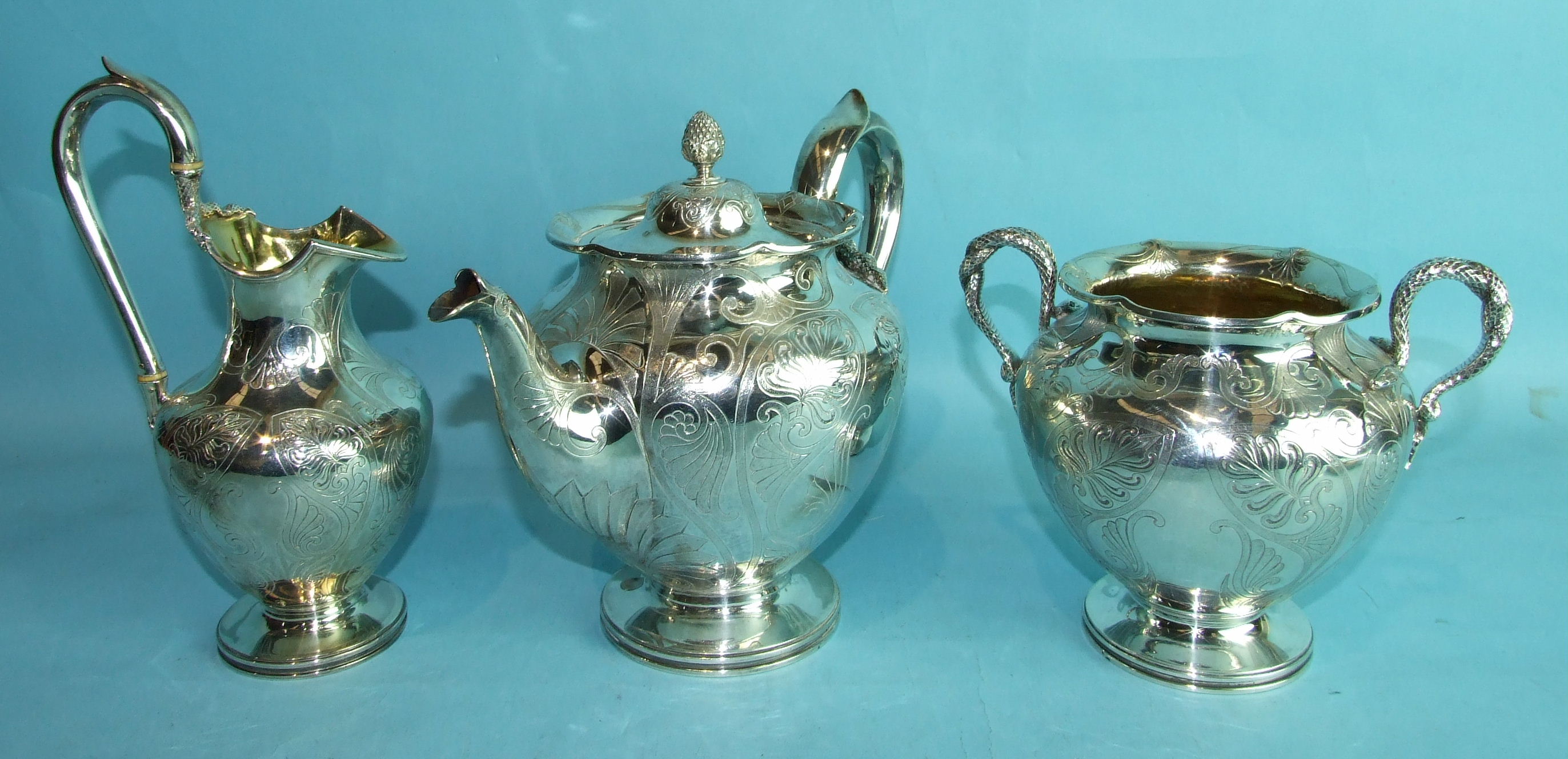 A three-piece good quality Victorian tea service by Charles Riley & George Storer, of baluster form,