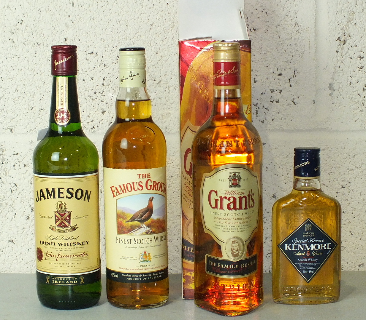 A collection of whisky: Grant's Family Reserve, 70cl, 40% vol, one bottle in box; Famous Grouse,