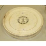 A Wedgwood ceramic circular stand with central advertising transfer print 'Parnall & Sons, 21, 22