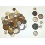 A small collection of coins, including an 1838 Trade & Navigation pure copper preferable to paper