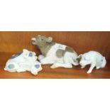 A Royal Copenhagen figure of a recumbent calf No.1072, 16cm long, a pair of pigs No.683 and a