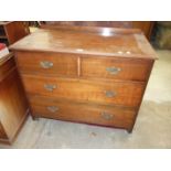 A mahogany straight-front chest of two short and two long drawers, 106cm wide and a kneehole