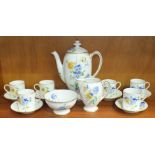 A Royal Doulton twelve-piece coffee set decorated with blue and yellow pansies, pattern no.4132, (