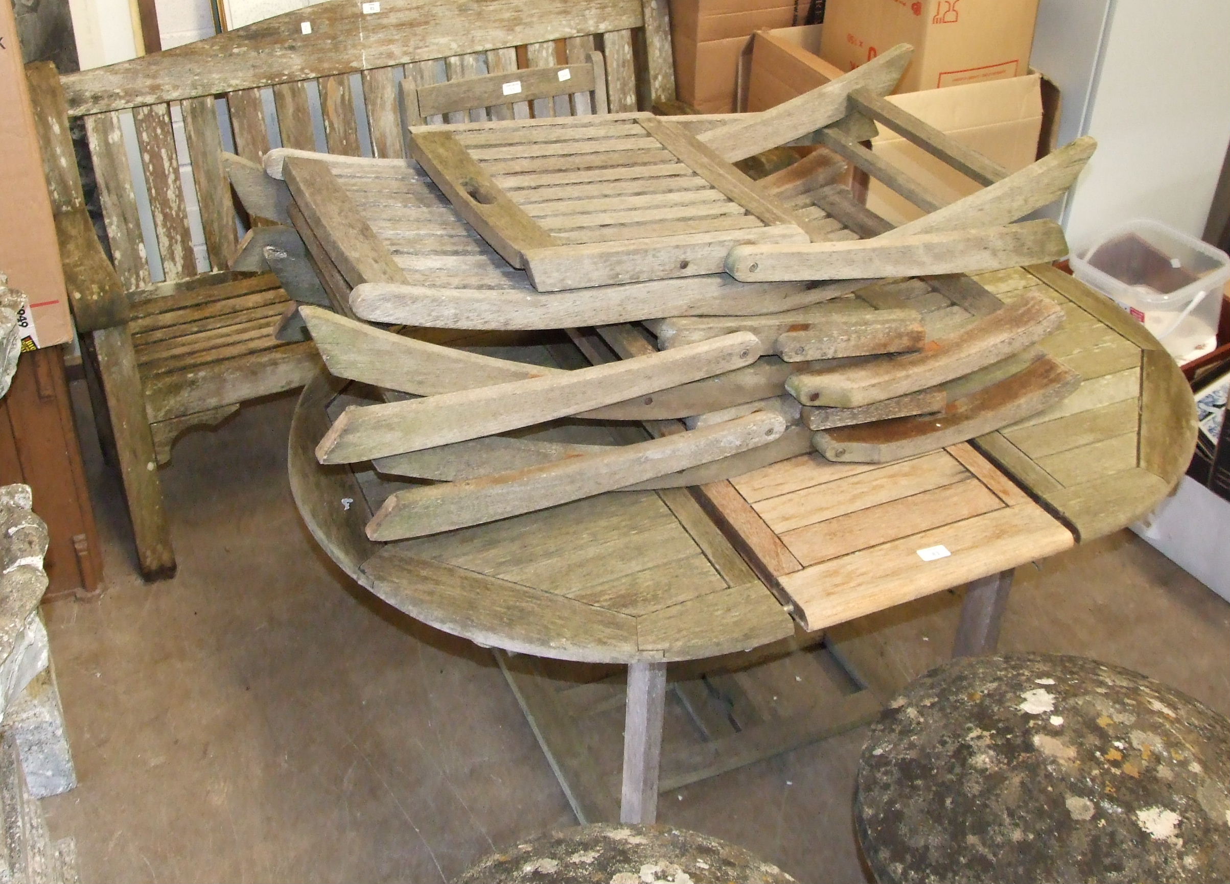 A teak garden bench, 156cm, a similar extending table and four folding chairs, (6). - Image 2 of 2