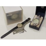 A Saab stainless steel quartz watch in original box, a Ricardo stainless steel watch, various