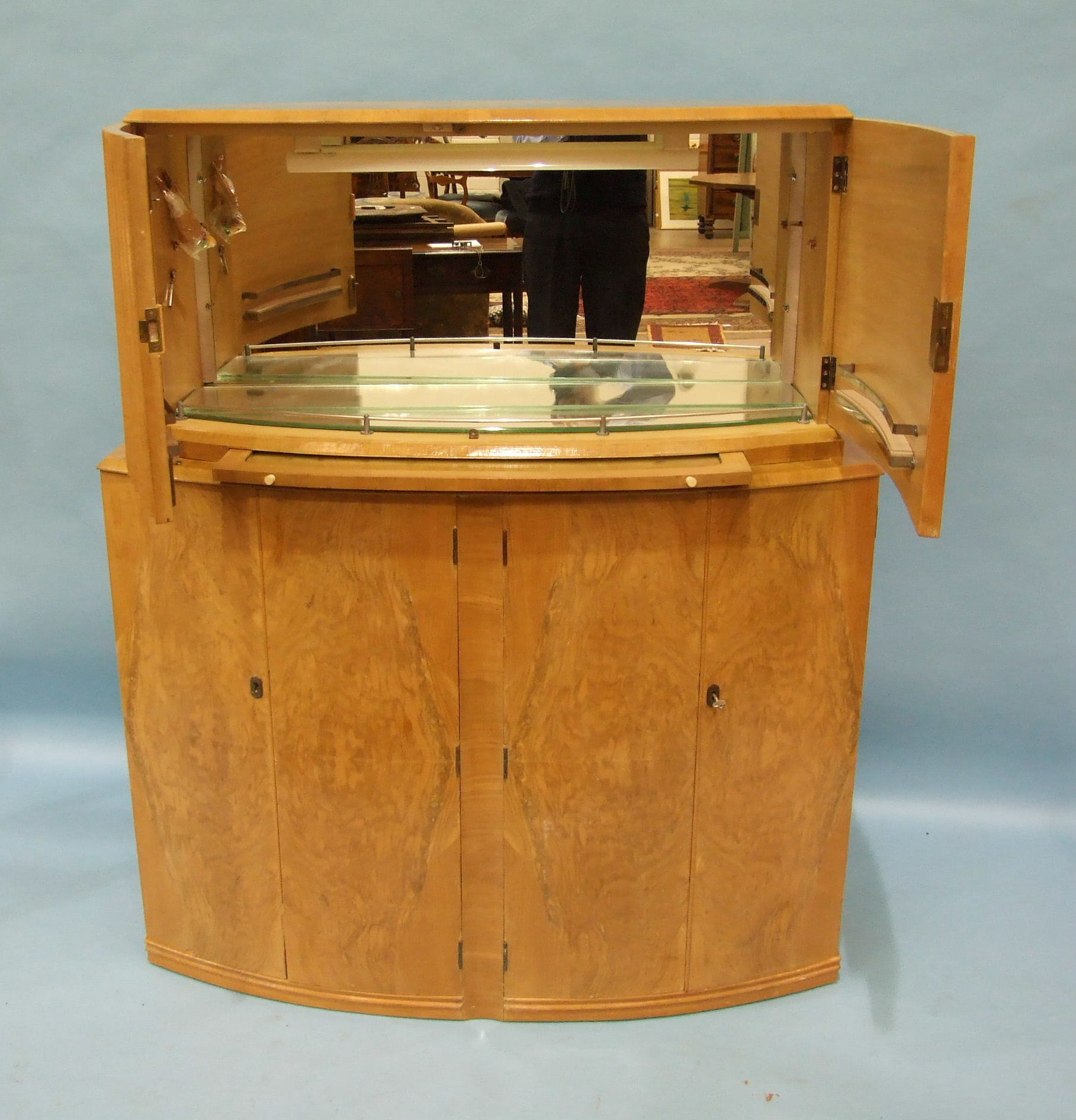 An Art Deco satin birch cocktail cabinet, having a pair of fluted hinged doors enclosing mirrored - Image 2 of 2