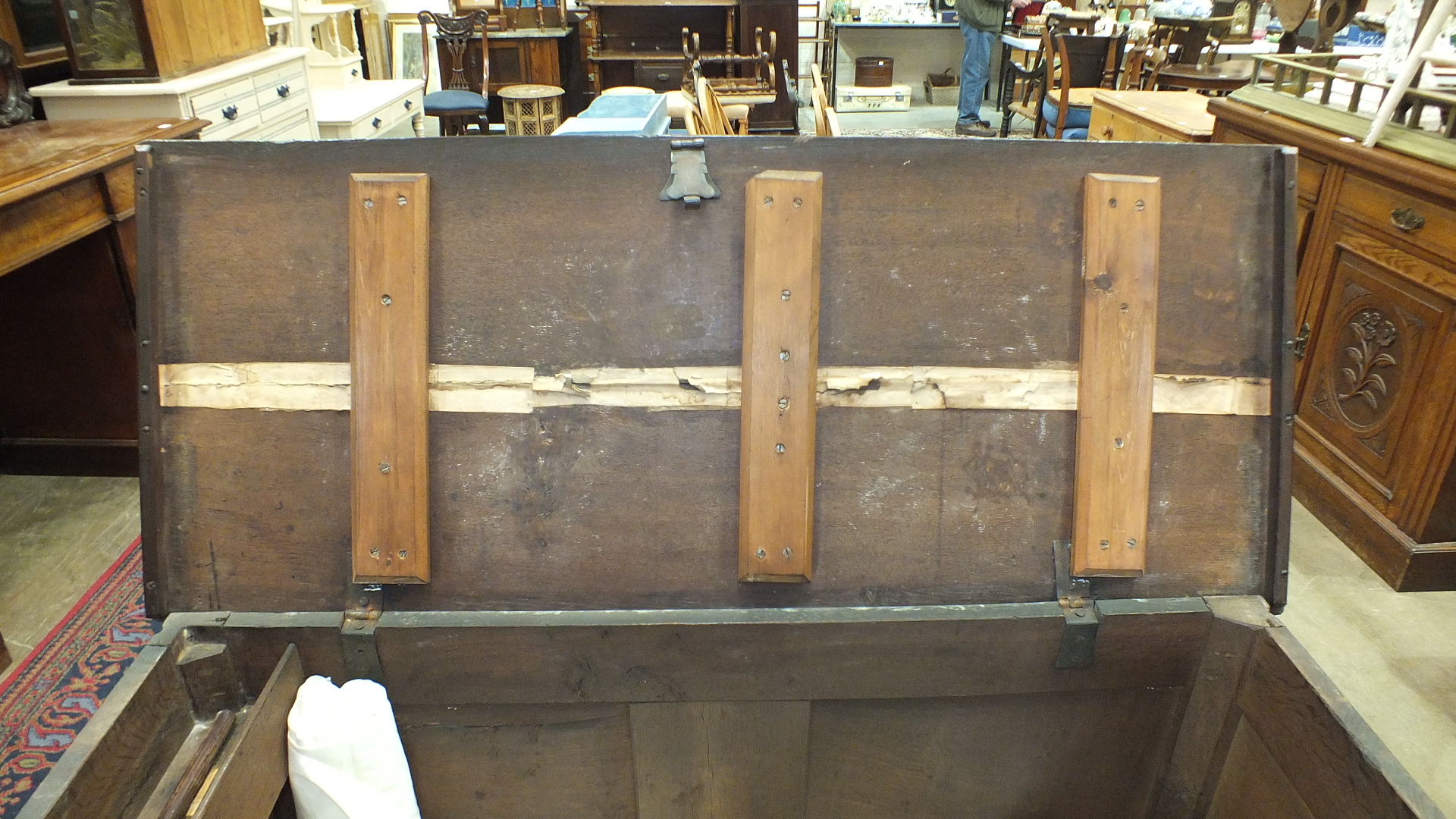 An antique oak coffer with carved panel front, 140cm wide. - Image 8 of 13